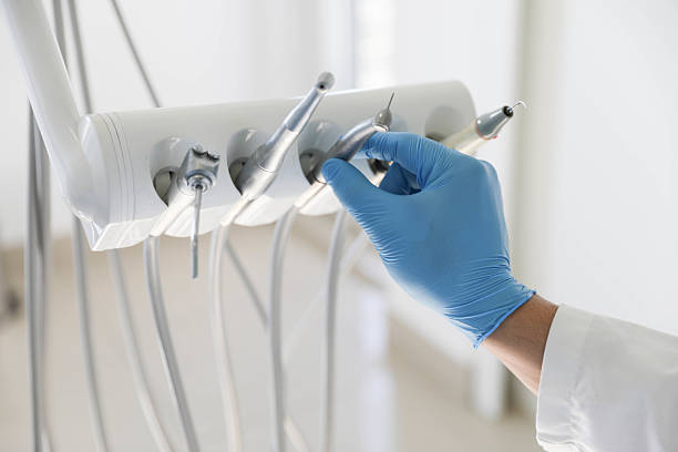 Professional Tooth Extraction technician working in Marlene Village, OR